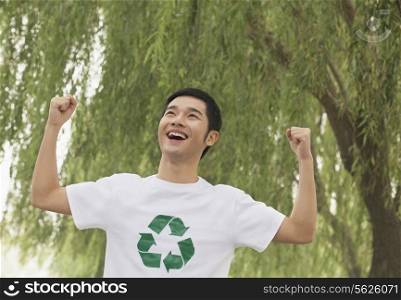 Young Man Smiling, Recycling Symbol, Beijing