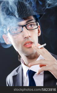 Young man smoking cigarette