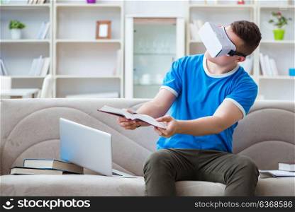 Young man student studying with virtual glasses