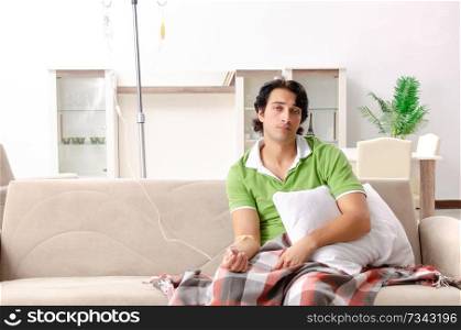 Young man suffering at home