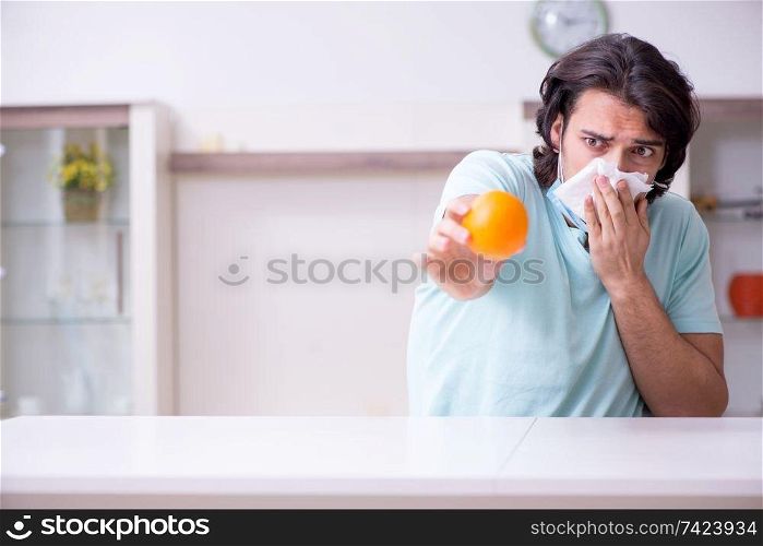 Young man suffering from allergy 