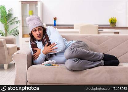 Young man suffering from flu at the home. Young man suffering from flu at home