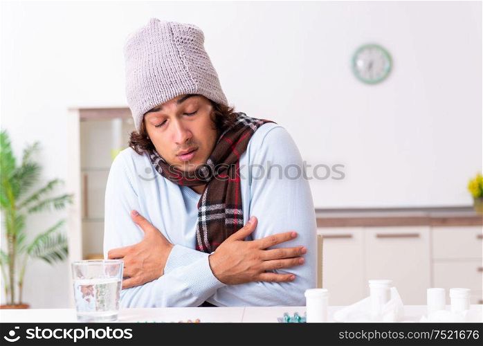 Young man suffering from flu at the home. Young man suffering from flu at home