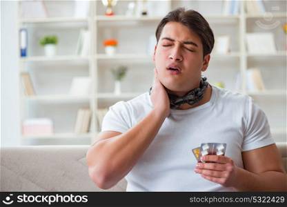 Young man suffering from sore throat
