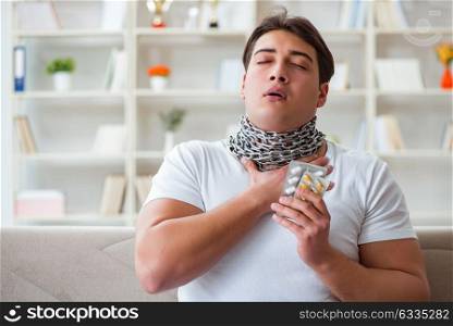 Young man suffering from sore throat. The young man suffering from sore throat