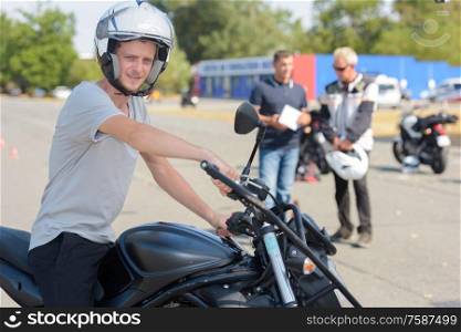young man taking motorbike license