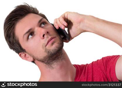 Young Man talking on the phone and looking up