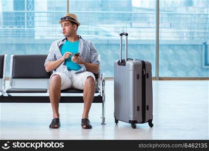 Young man travelling for his summer beach vacation