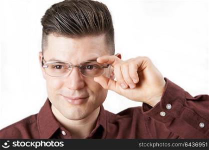 Young Man Trying On New Glasses