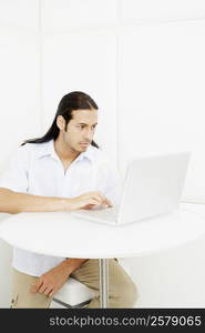 Young man using a laptop