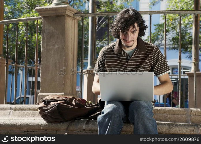 Young man using a laptop