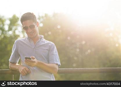 Young man using cell phone