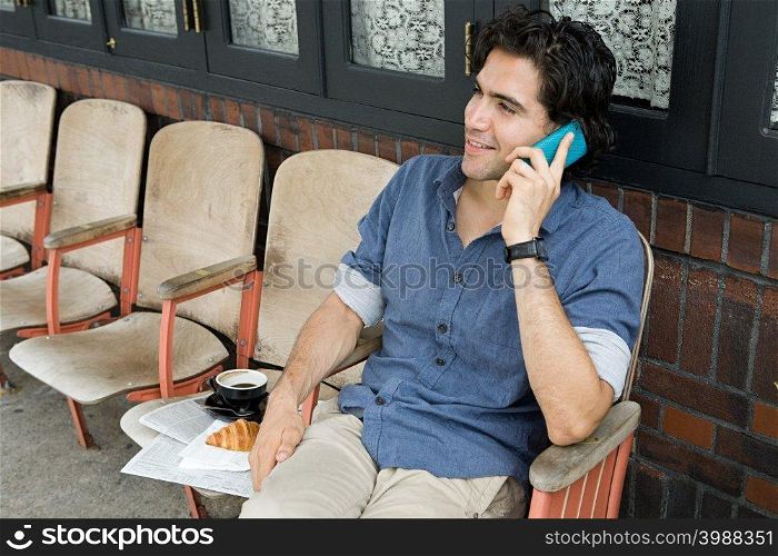 Young man using cellphone