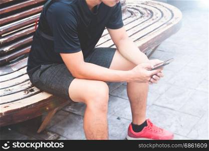 Young man using mobile smart phone
