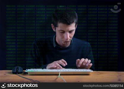 young man using the computer, programmer with lines of code