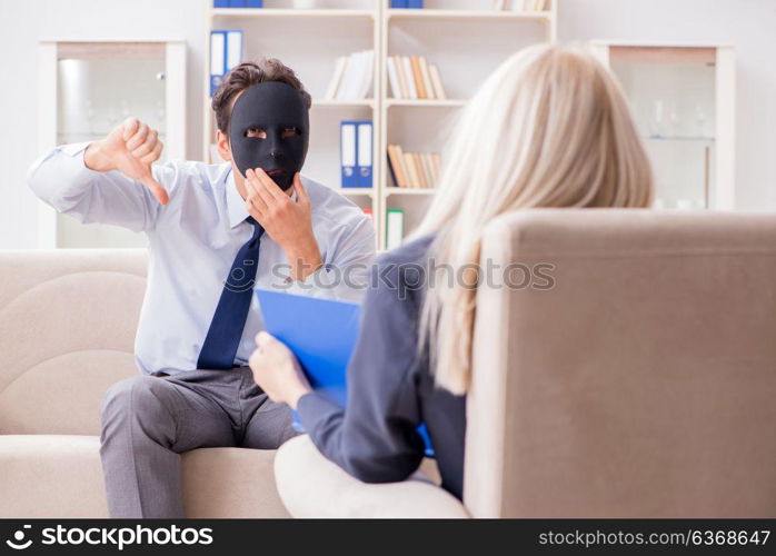 Young man visiting psychiatrist doctor for consultation