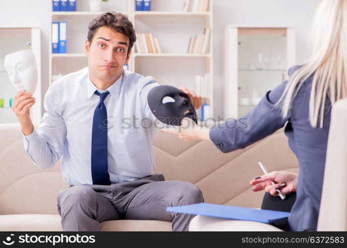 Young man visiting psychiatrist doctor for consultation