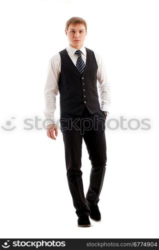 Young man walking. Isolated over white.