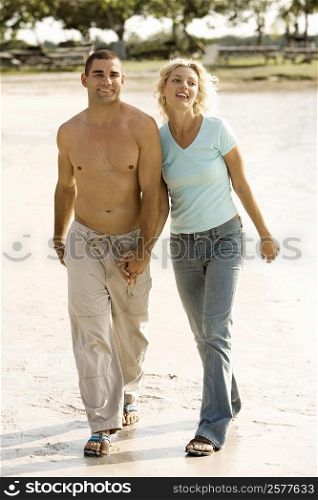 Young man walking with a young woman