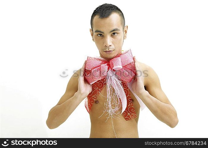Young man wearing a red ribbon