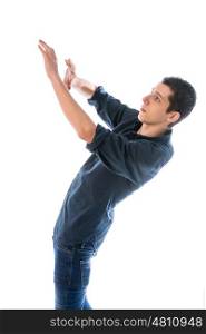 young man wearing blue shirt flinched his arms scared against white background