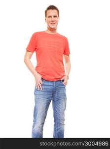 Young man wearing red t-shirt jeans casual fashion style with hands in pockets, isolated on white background