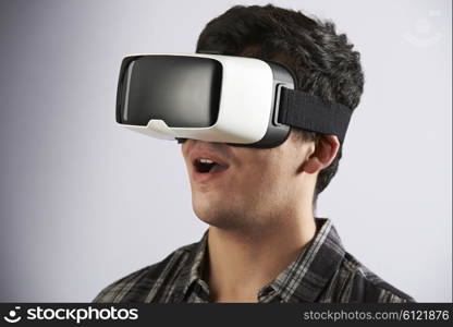 Young Man Wearing Virtual Reality Headset