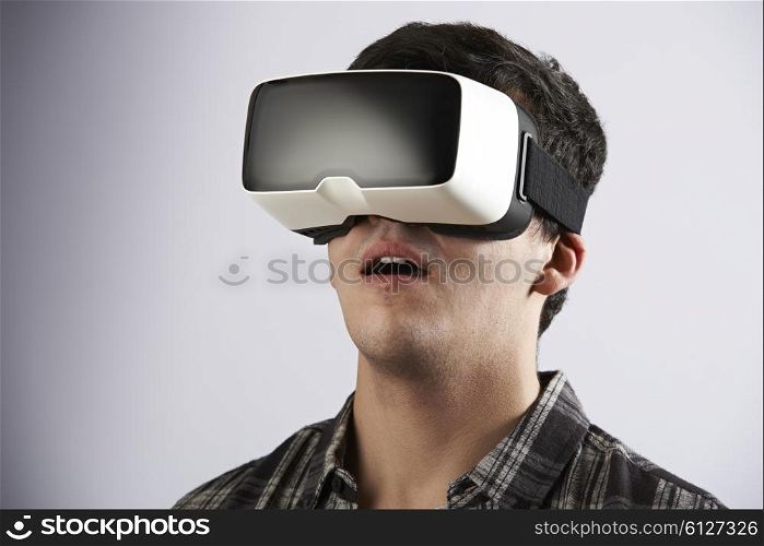 Young Man Wearing Virtual Reality Headset