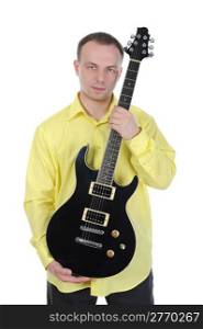 Young man with a black guitar. Isolated on white background