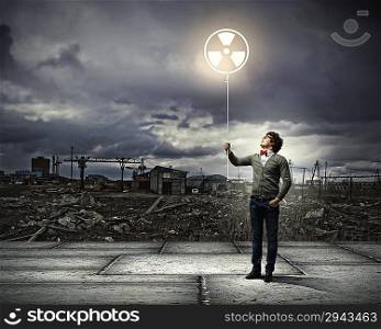 Young man with a recycle symbol