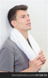 young man with a towel