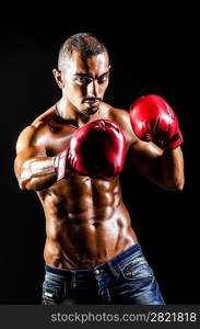 Young man with boxing gloves