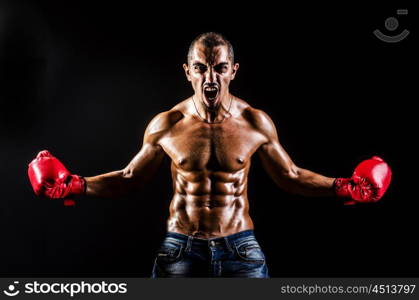 Young man with boxing gloves