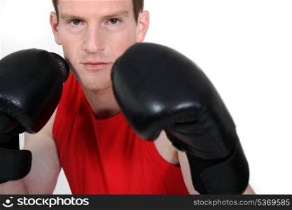young man with boxing gloves