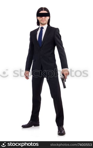 Young man with covered eyes and gun isolated on white. Young man with black face mask on white