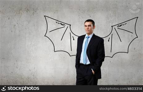 Young man with drawn wings behind back. Man with bat wings