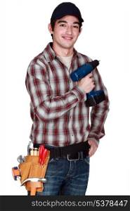 Young man with drill in hand