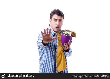 Young man with flower pot isolated on white