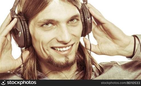 Young man with headphones listening to music. Guy relaxing enjoying. People relax leisure pleasure concept. Isolated on white background.