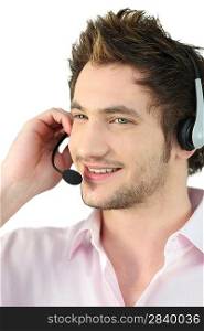 young man with headset speaking