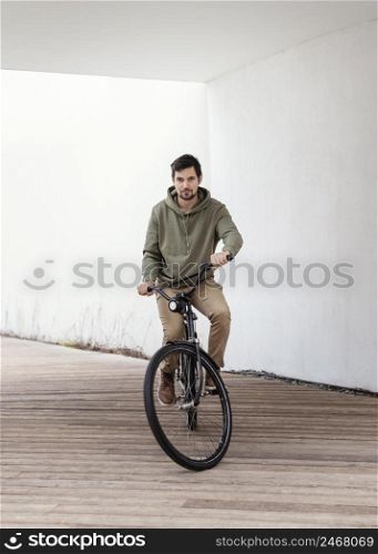 young man with his bike tunnel