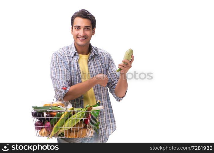 Young man with his grocery shopping on white