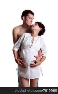Young man with his pregnant wife on the white background