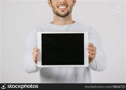 young man with horizontal tablet. High resolution photo. young man with horizontal tablet. High quality photo