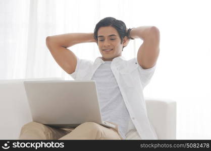 Young man with laptop