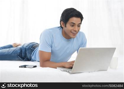 Young man with laptop