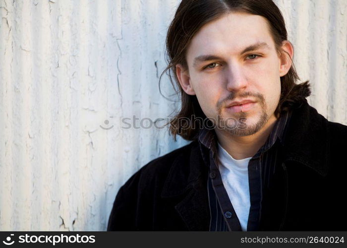 Young man with lip piercing, portrait