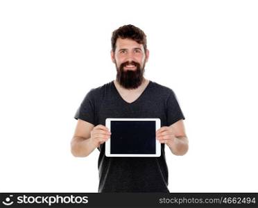 Young man with long beard and a tablet isolated on a white background