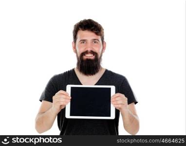 Young man with long beard and a tablet isolated on a white background