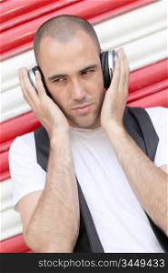 Young man with music headphones